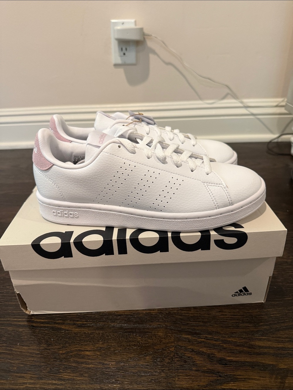 adidas Women’s White Low-Top Leather Sneakers with pink accents